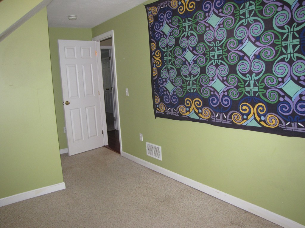 2 Erick Road Mansfield, MA 02048 - Photo 16 of 25 an empty room with a walk in closet