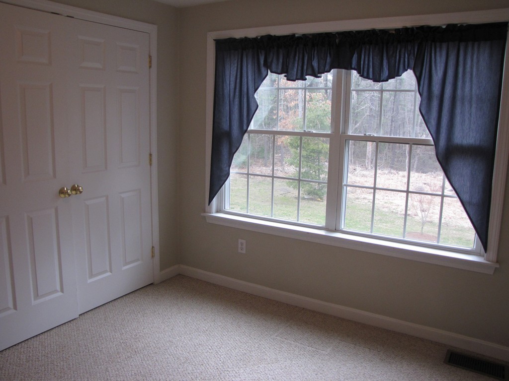 2 Erick Road Mansfield, MA 02048 - Photo 18 of 25 an empty room with a window