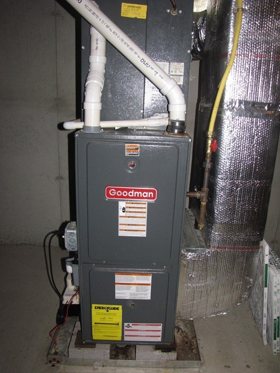 2 Erick Road Mansfield, MA 02048 - Photo 19 of 25 a view of water heater room