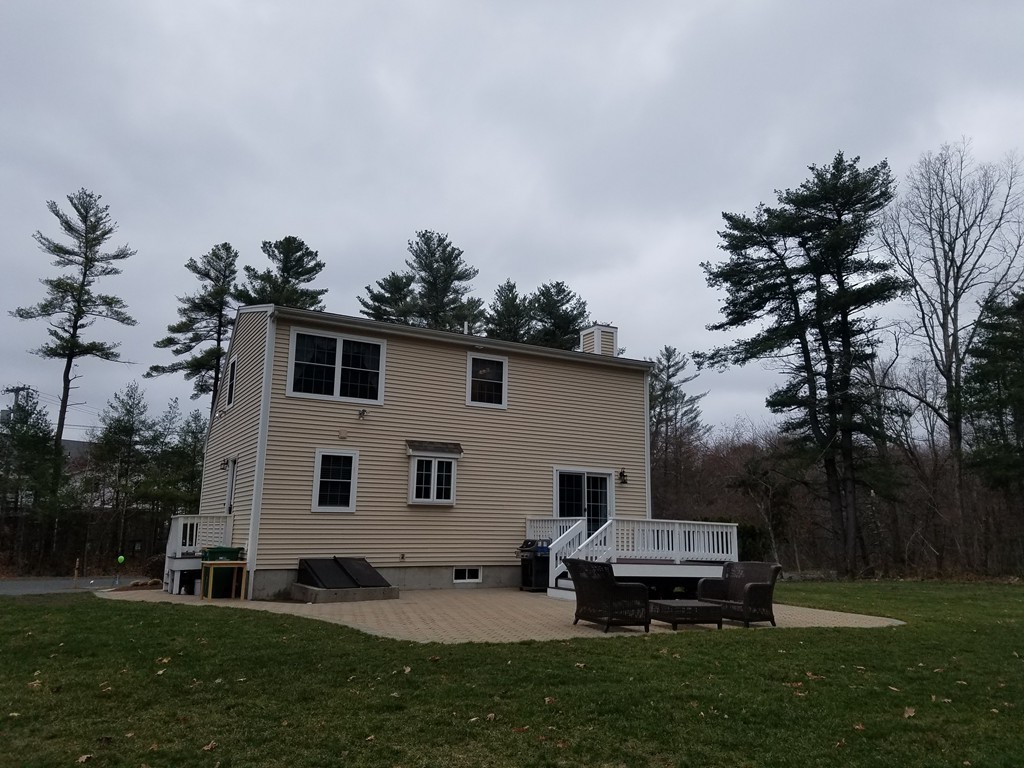 2 Erick Road Mansfield, MA 02048 - Photo 21 of 25 a house view with a sitting space and garden