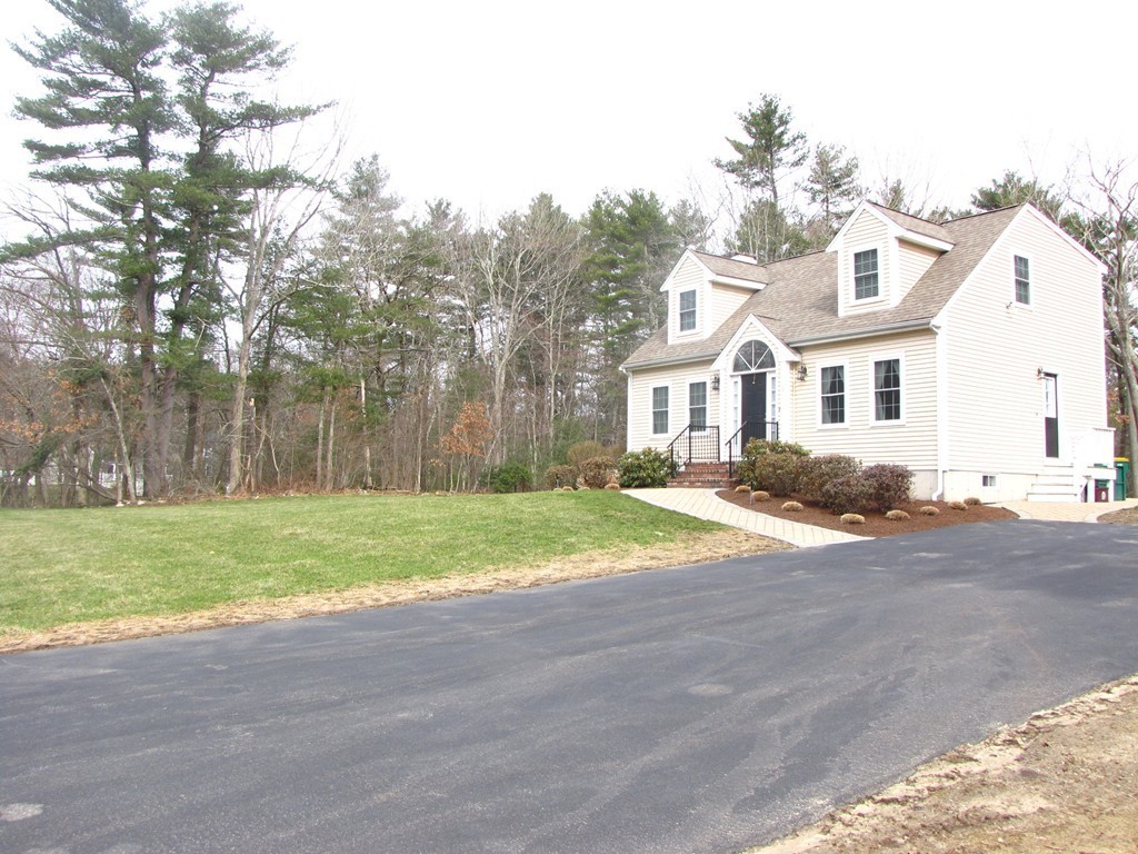 2 Erick Road Mansfield, MA 02048 - Photo 25 of 25 a view of a house with a yard and garage