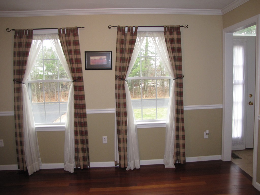 2 Erick Road Mansfield, MA 02048 - Photo 10 of 25 a view of empty room with wooden floor and fan