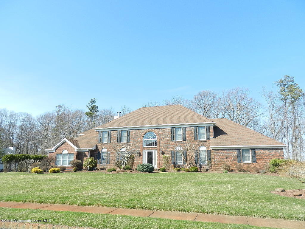 21 Statesboro Road Freehold, NJ 07728 - Photo 1 of 30 a view of a house with a big yard and large trees