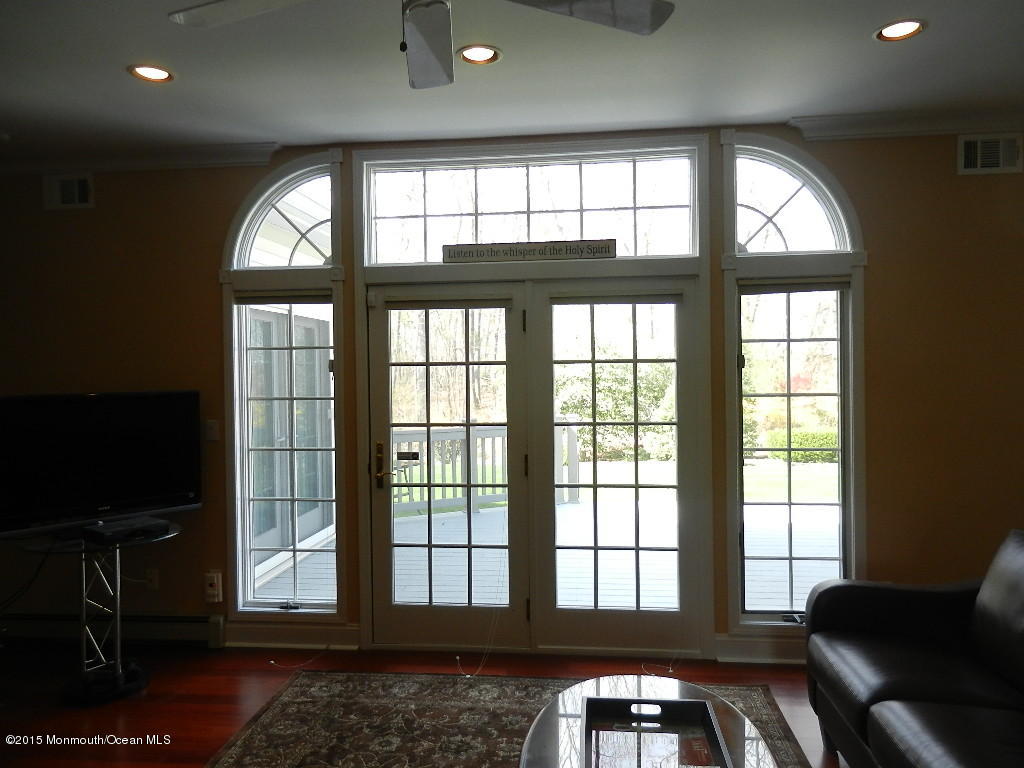 21 Statesboro Road Freehold, NJ 07728 - Photo 11 of 30 a view of a livingroom with furniture and windows