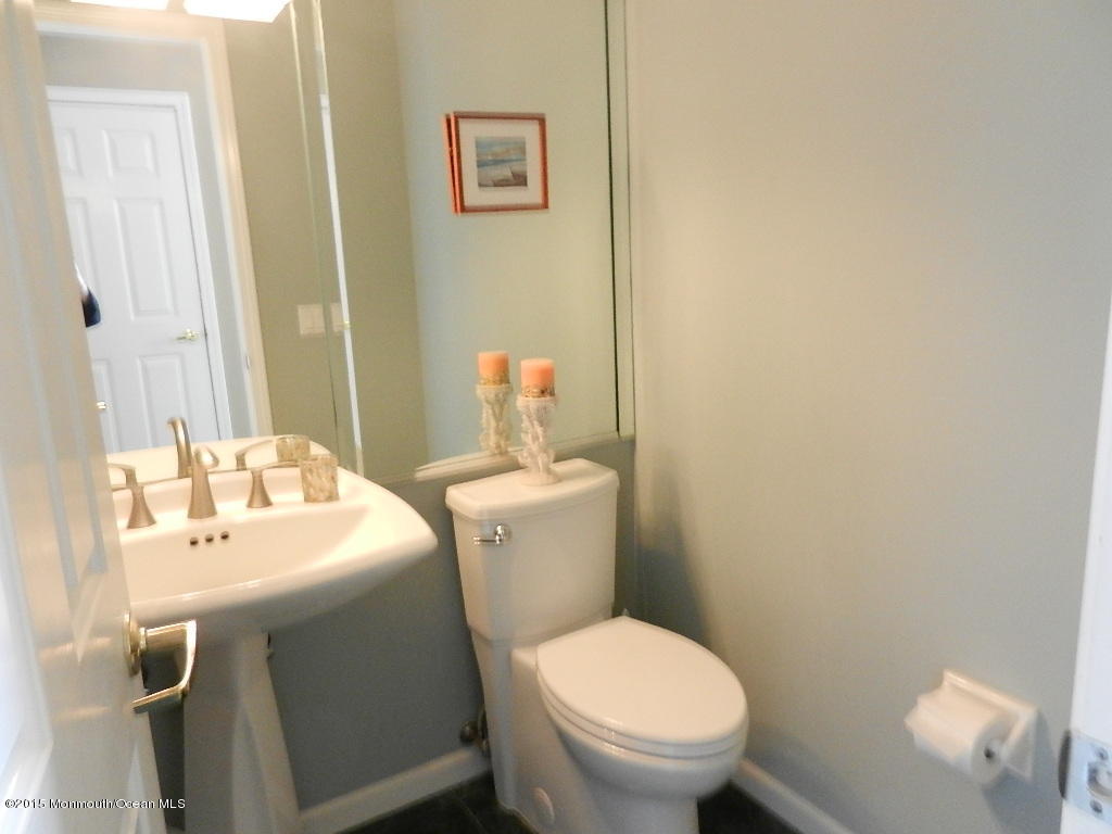 21 Statesboro Road Freehold, NJ 07728 - Photo 14 of 30 a bathroom with a sink and a toilet