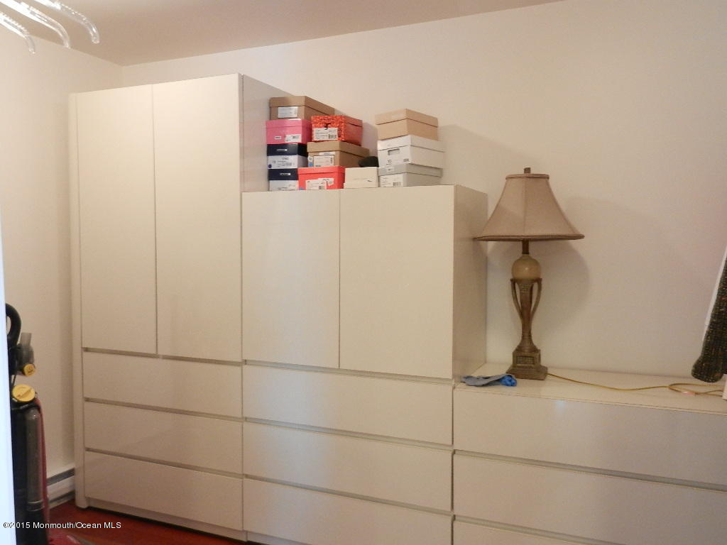 21 Statesboro Road Freehold, NJ 07728 - Photo 19 of 30 a room with storage and utility