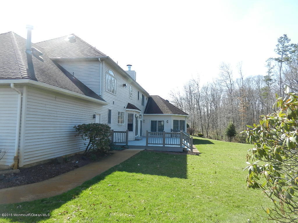 21 Statesboro Road Freehold, NJ 07728 - Photo 2 of 30 a house view with a garden space