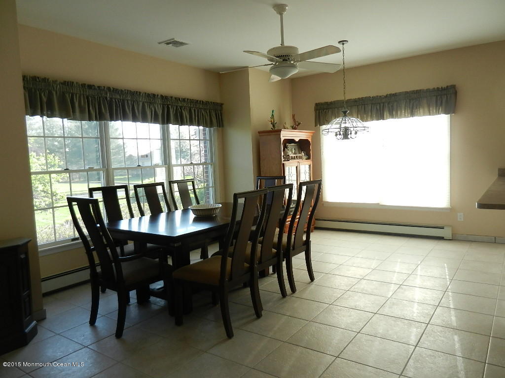 21 Statesboro Road Freehold, NJ 07728 - Photo 24 of 30 a view of a dining room with furniture window and outside view