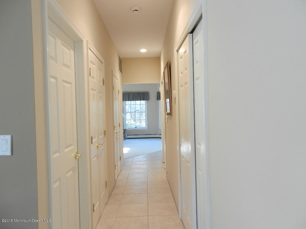 21 Statesboro Road Freehold, NJ 07728 - Photo 27 of 30 a view of hallway with a bathroom