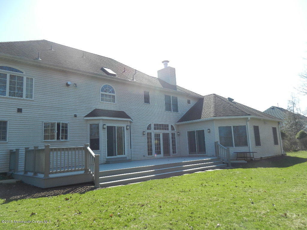 21 Statesboro Road Freehold, NJ 07728 - Photo 3 of 30 a front view of a house with a yard