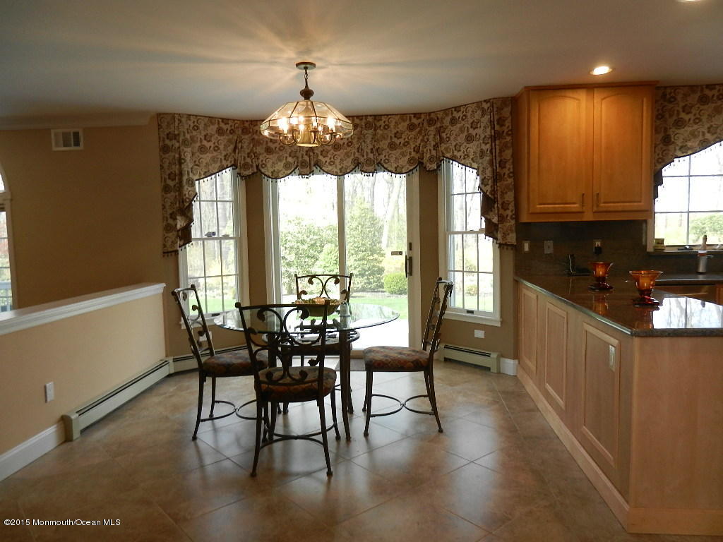 21 Statesboro Road Freehold, NJ 07728 - Photo 8 of 30 a view of a dining room with furniture window and outside view