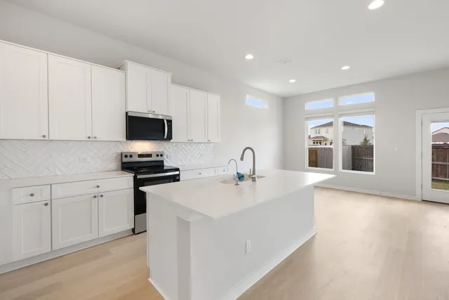 a view of a kitchen with electric equipment