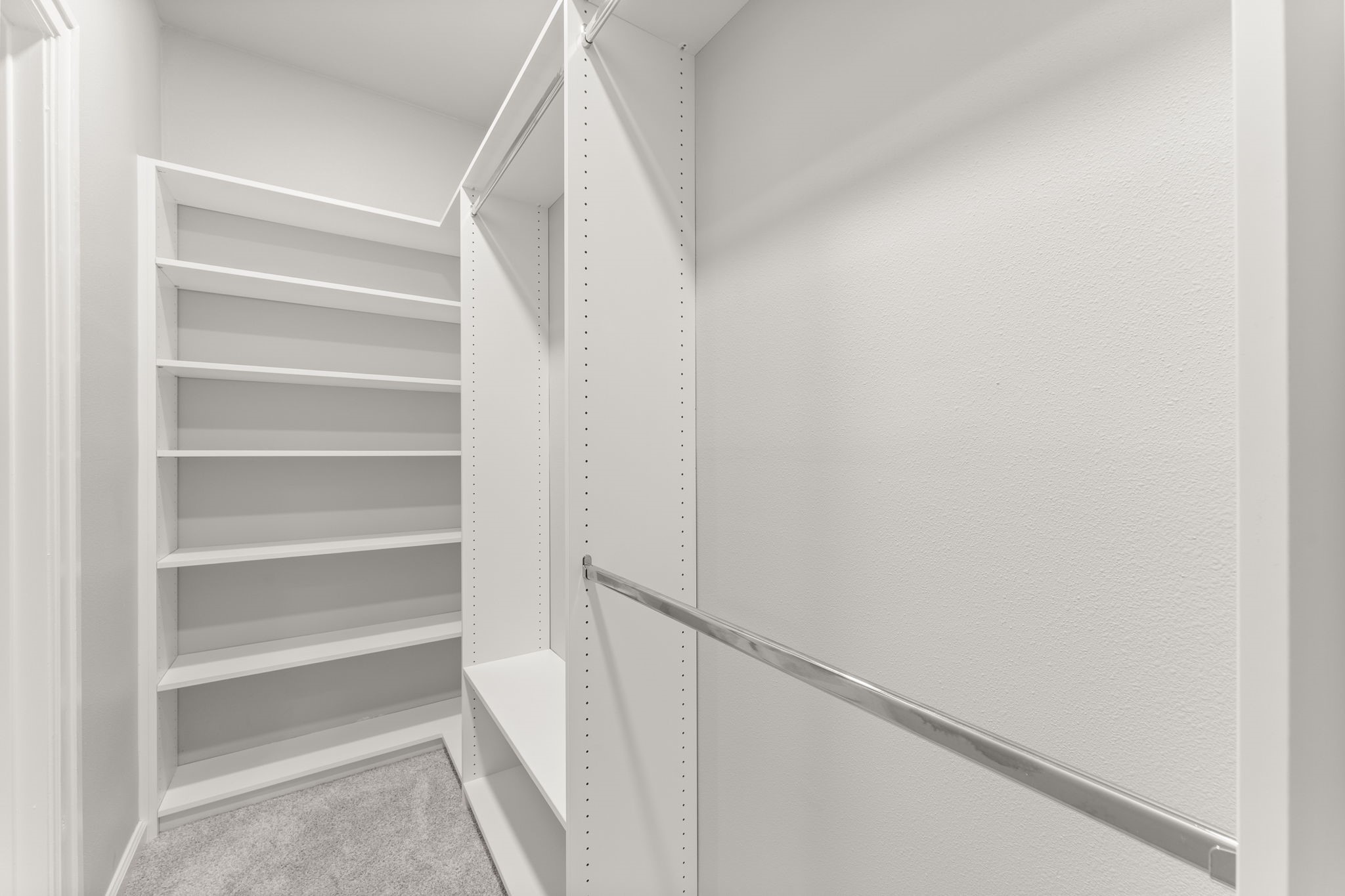 6415 Singing Creek Lane Spring, TX 77379 - Photo 22 of 34 New custom closet systems have been installed in BOTH downstairs primary closets.