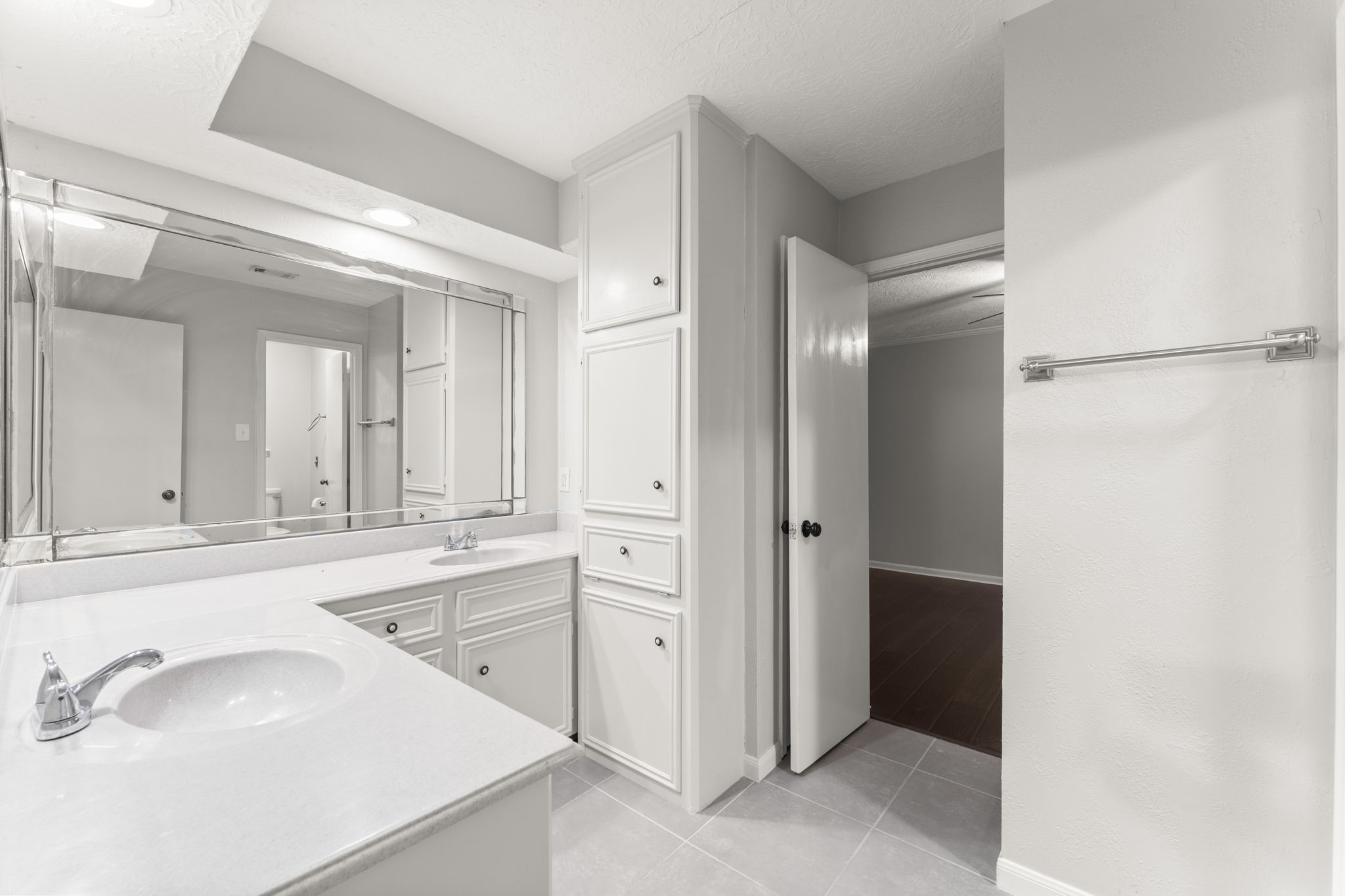 6415 Singing Creek Lane Spring, TX 77379 - Photo 24 of 29 a bathroom with a sink and a mirror
