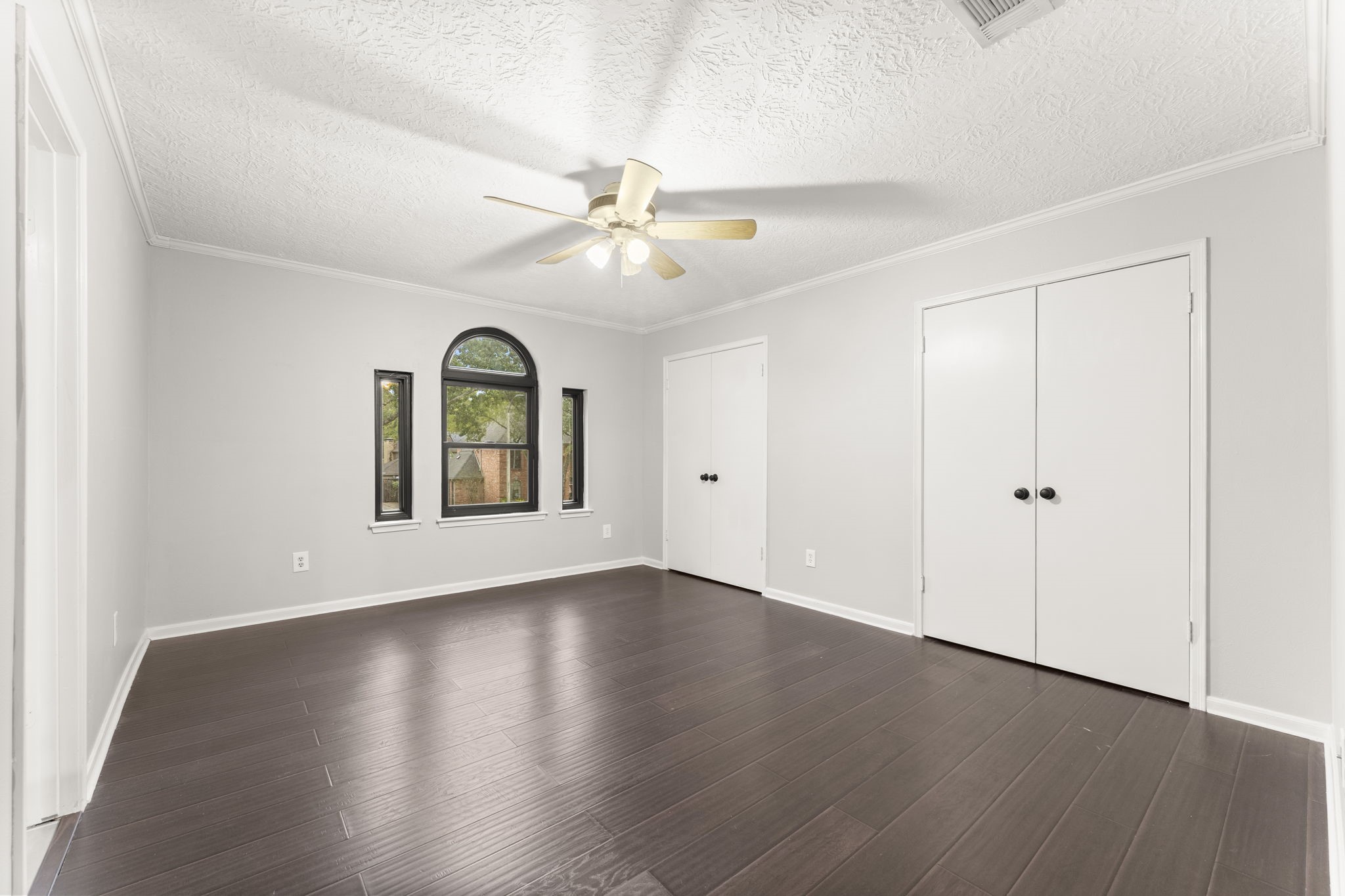 6415 Singing Creek Lane Spring, TX 77379 - Photo 27 of 34 This secondary bedroom has beautiful engineered wood floor and 2 closets! There is also access to the Jack & Jill bathroom.