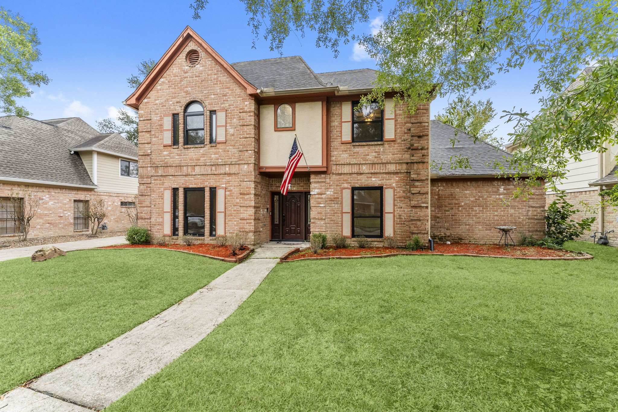 6415 Singing Creek Lane Spring, TX 77379 - Photo 29 of 29 a front view of a house with a yard