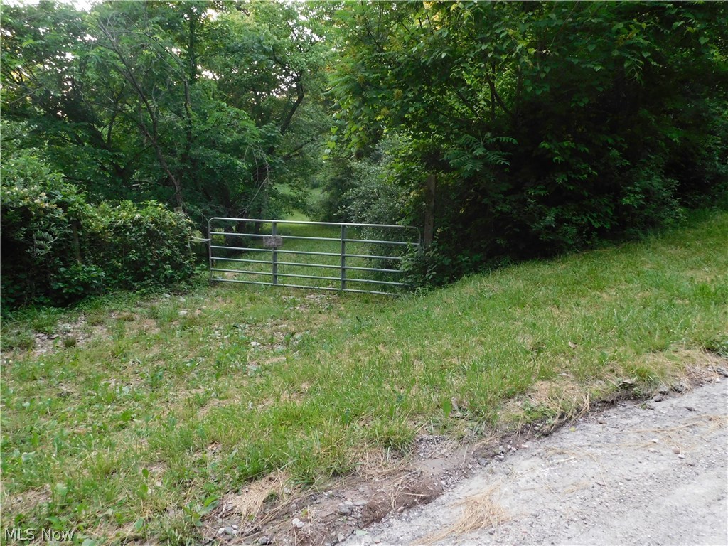 0 Man Of War Road Walker, WV 26180 - Photo 1 of 10 Seller had cleared a place behind the gated area to build but then decided not to move. Seller is willing to walk the property with anyone truly interested and answer your questions.