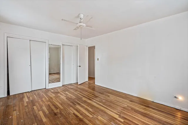 a white refrigerator freezer and a stove sitting inside of a kitchen