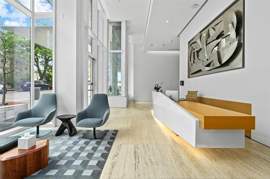 313 West 17th Street, Unit 2003 Austin, TX 78701 - Photo 18 of 25 a living room with furniture and a rug