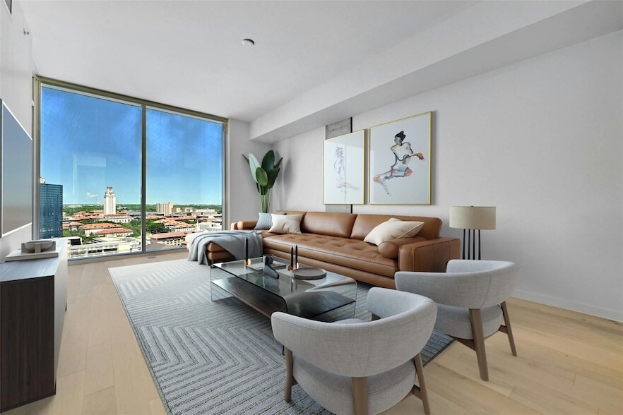 313 West 17th Street, Unit 2003 Austin, TX 78701 - Photo 7 of 25 a living room with furniture and a couch