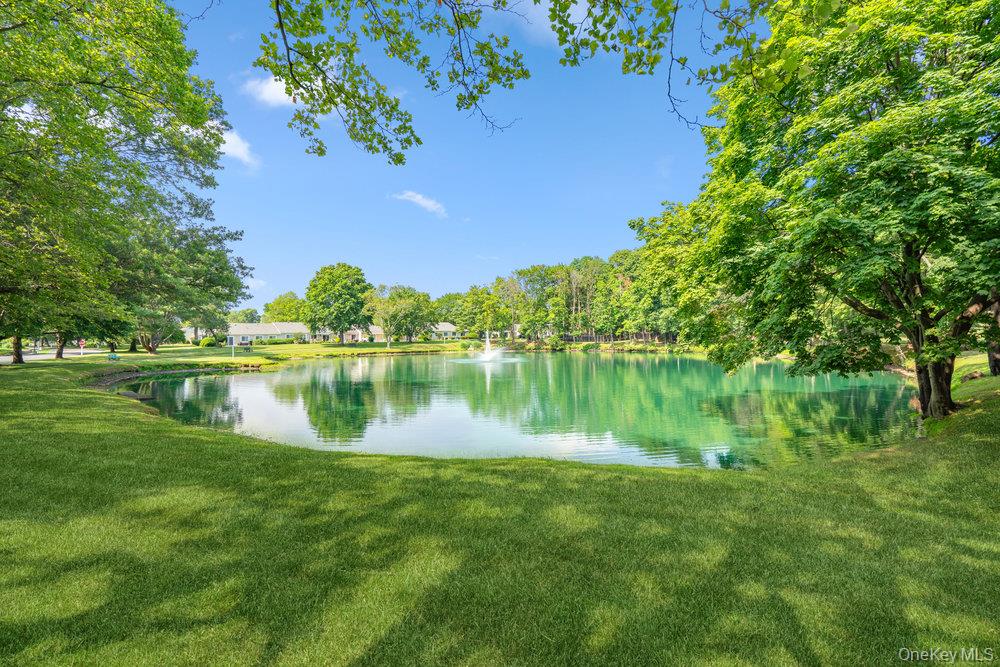 914 Fenway Road St. James, NY 11780 - Photo 32 of 35 a view of lake with green space