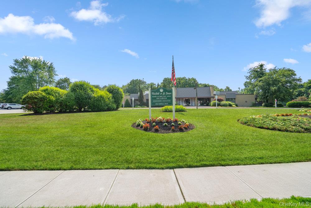 914 Fenway Road St. James, NY 11780 - Photo 35 of 35 a view of a garden with a slide