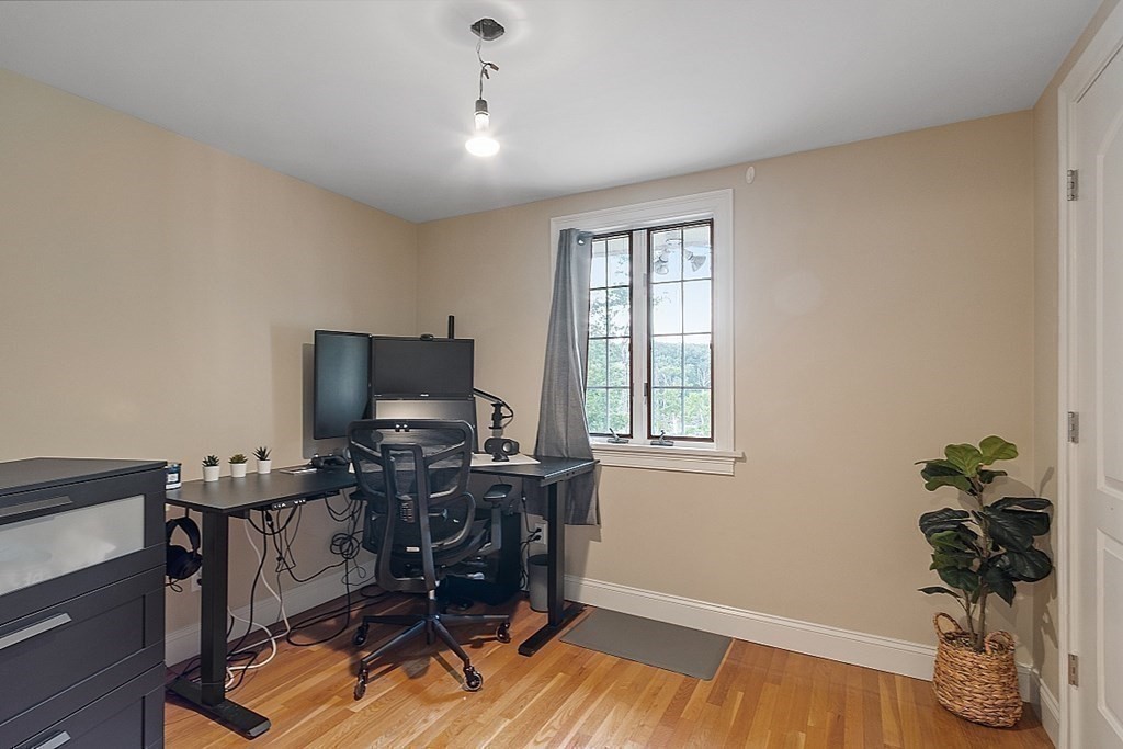 25 Viking Road Saugus, MA 01906 - Photo 16 of 33 a workspace with furniture and a potted plant