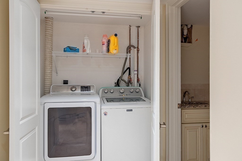 25 Viking Road Saugus, MA 01906 - Photo 22 of 33 a utility room with dryer and washer