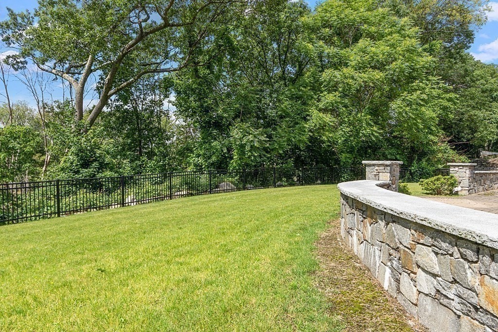 25 Viking Road Saugus, MA 01906 - Photo 28 of 33 a view of a backyard with a trees