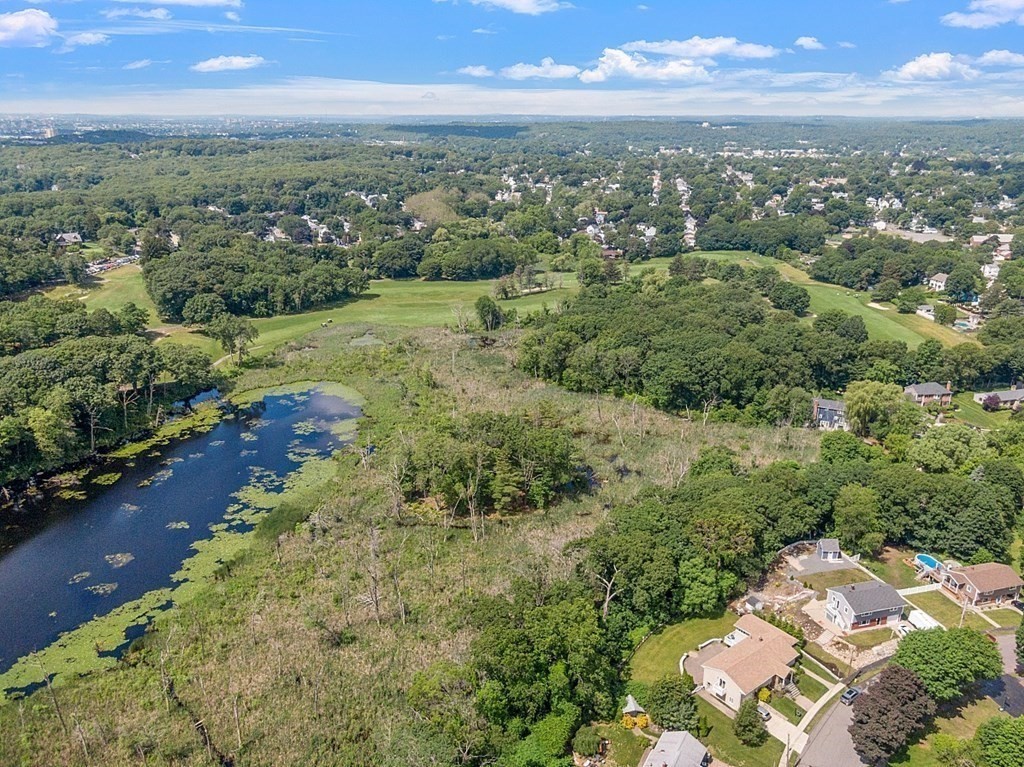 25 Viking Road Saugus, MA 01906 - Photo 30 of 33 an aerial view of residential building with outdoor space and trees