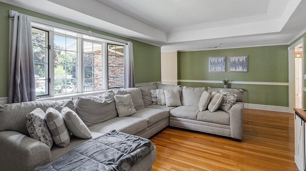 25 Viking Road Saugus, MA 01906 - Photo 5 of 33 a living room with furniture and a large window