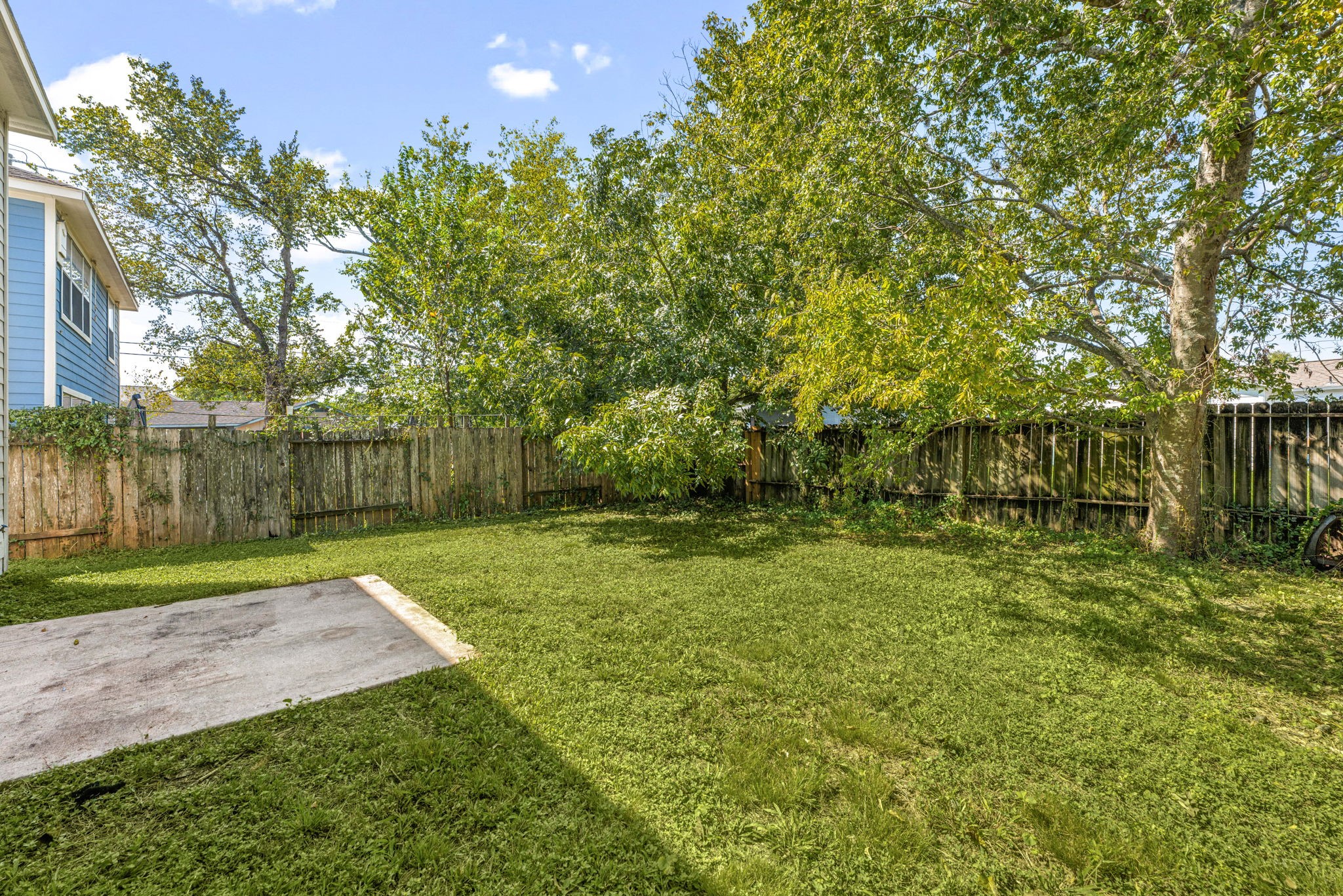 6418 England Street Houston, TX 77021 - Photo 24 of 31 Private fenced backyard perfect for BBQs, pets, and outdoor activities.
