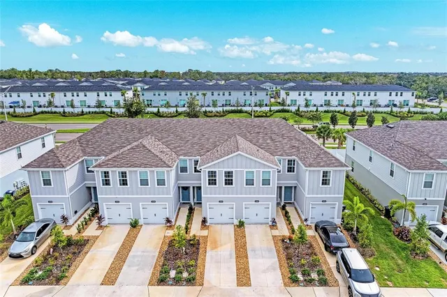 a view of a city with tall buildings