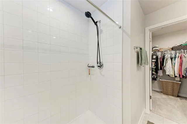 a bedroom with furniture and wooden floor