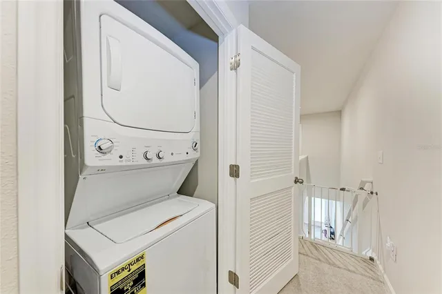 a view of a house with backyard sitting area and porch