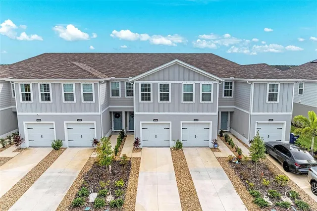 a view of a city with tall buildings