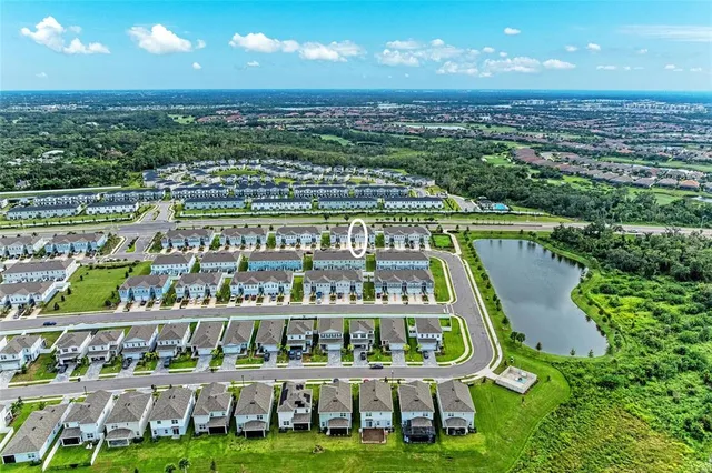 a view of a city with an ocean view
