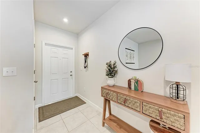 a bathroom with a sink a mirror and a vanity