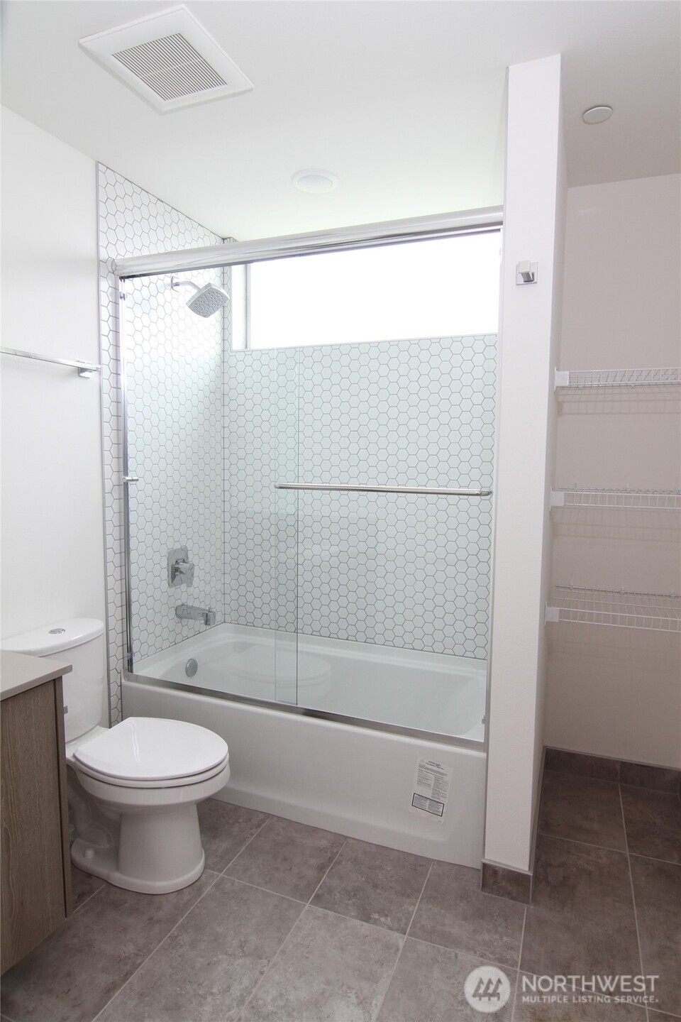 4724 31st Avenue South Seattle, WA 98108 - Photo 14 of 24 a bathroom with a shower and a toilet