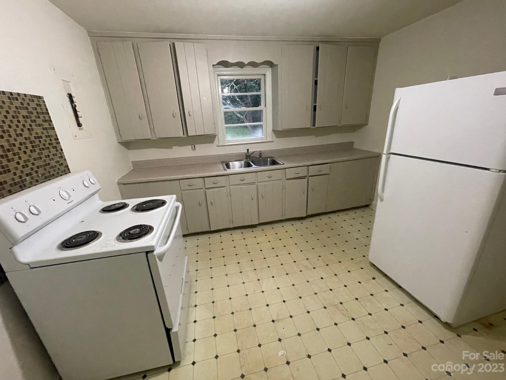 8710 Moody Road Charlotte, NC 28215 - Photo 12 of 14 a utility room with dryer and washer