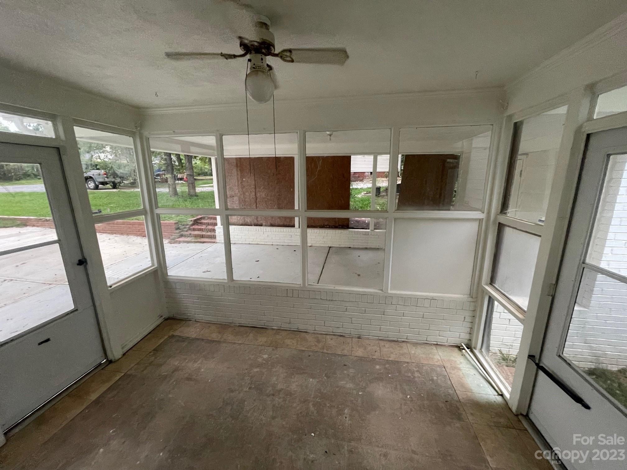 8710 Moody Road Charlotte, NC 28215 - Photo 13 of 14 wooden floor in an empty room with a window