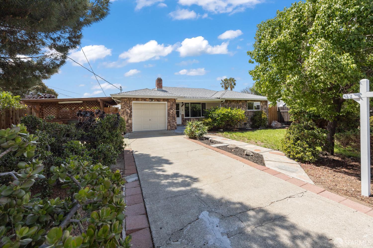 196 Loftus Road Pittsburg, CA 94565 - Photo 25 of 25 a front view of a house with a garden