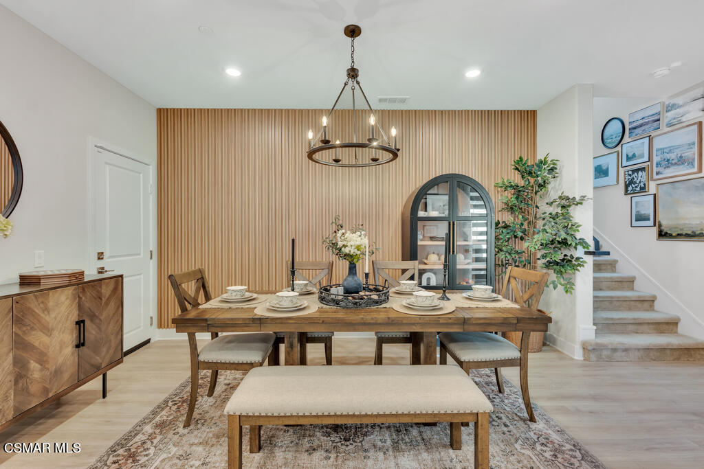 3028 Harrison Lane Simi Valley, CA 93065 - Photo 12 of 47 a view of a dining room with furniture wooden floor and chandelier