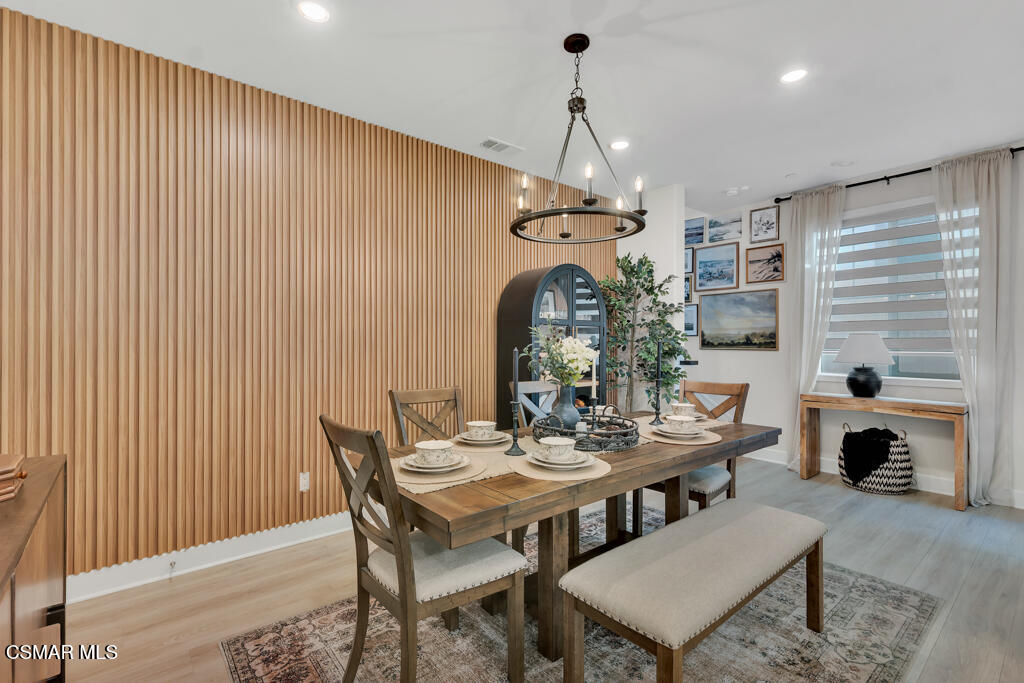 3028 Harrison Lane Simi Valley, CA 93065 - Photo 13 of 47 a view of a dining room with furniture window and wooden floor