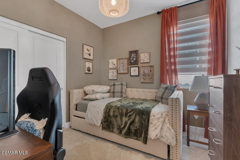 3028 Harrison Lane Simi Valley, CA 93065 - Photo 23 of 47 a bedroom with a bed and wooden floor
