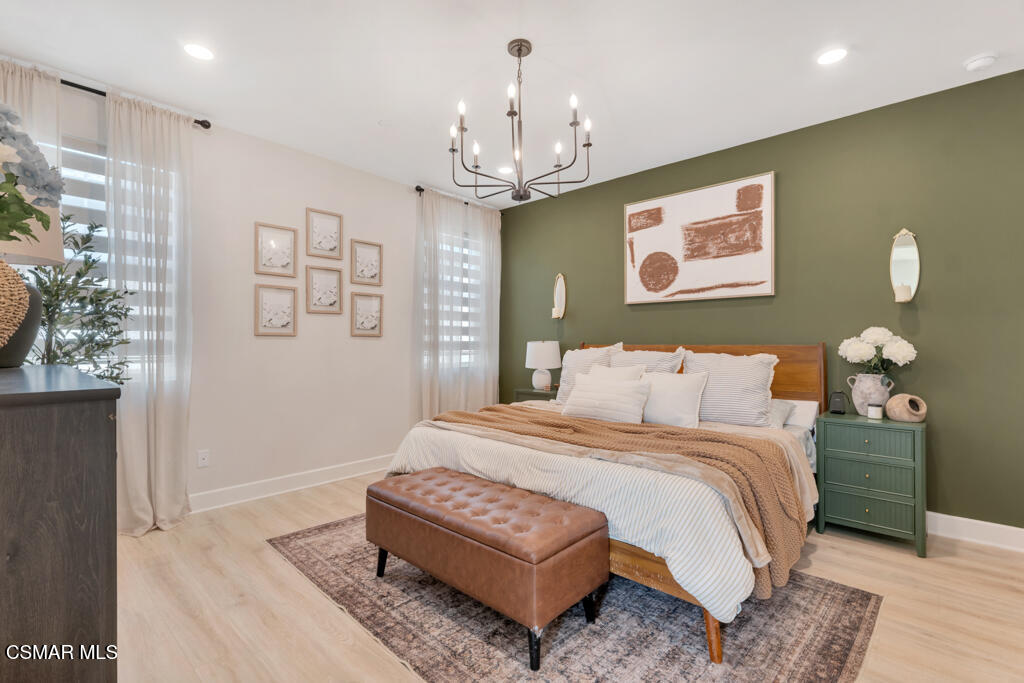 3028 Harrison Lane Simi Valley, CA 93065 - Photo 27 of 47 a bedroom with a bed mirror and a window