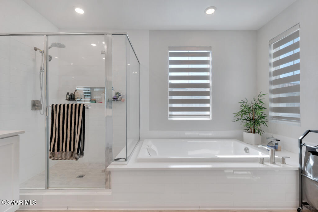 3028 Harrison Lane Simi Valley, CA 93065 - Photo 30 of 47 a bathroom with a bathtub and a shower