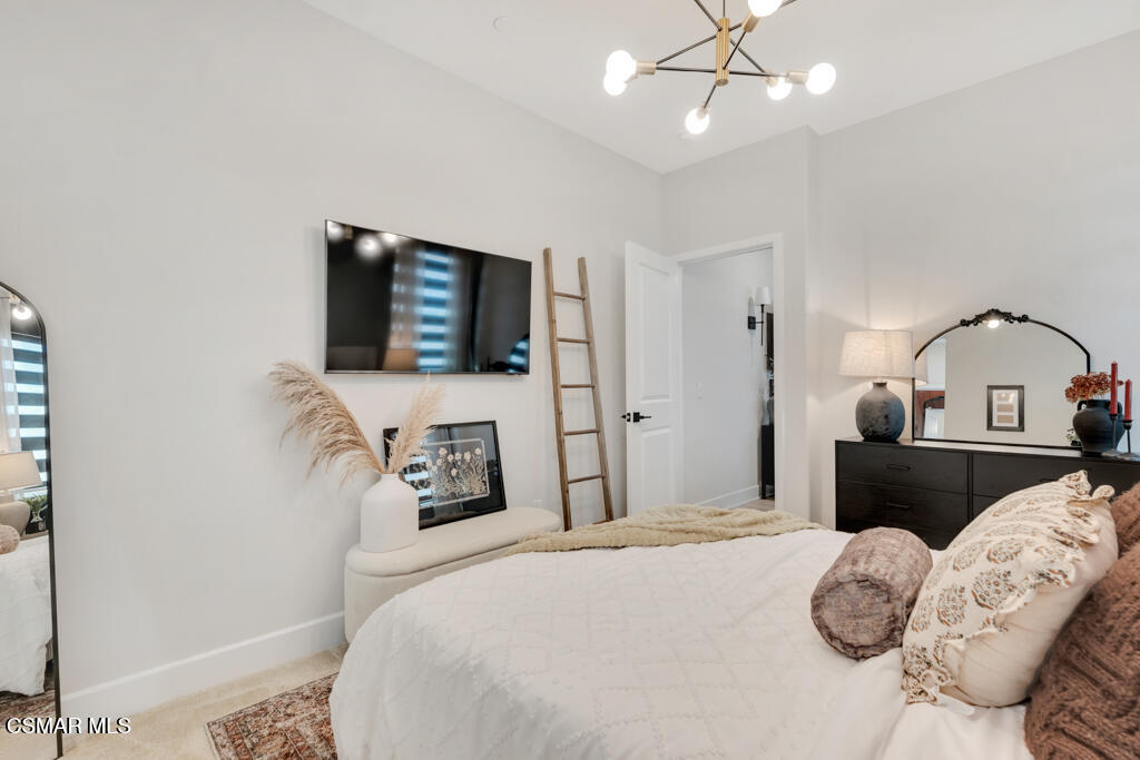 3028 Harrison Lane Simi Valley, CA 93065 - Photo 34 of 47 a bedroom with a bed and a television