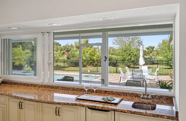 a bedroom with a bed and a chair