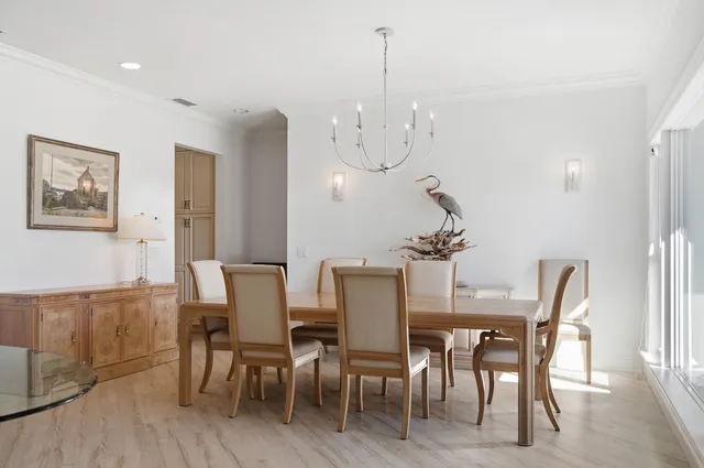 a bathroom with a granite countertop sink mirror and a bathtub